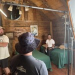 2nd Location - PA Max Nesmith, ADP Brian Hamm and DP Aaron Leong during day 2 shoot inside historic cabin at Kennedy Meadows.